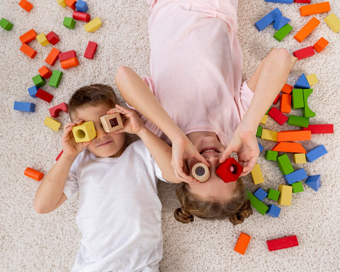 two kids playing with blocks