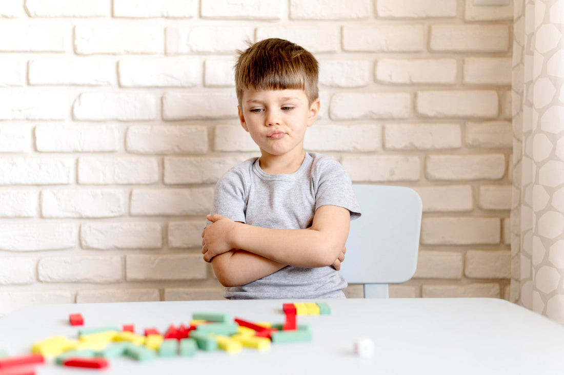 Boy who is upset about losing at a game