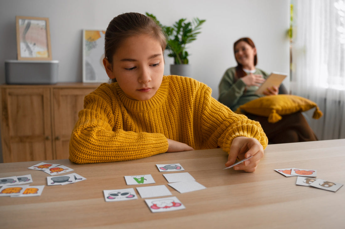 Child playing a matching game while an ABA therapist watches