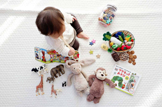small child playing with toys