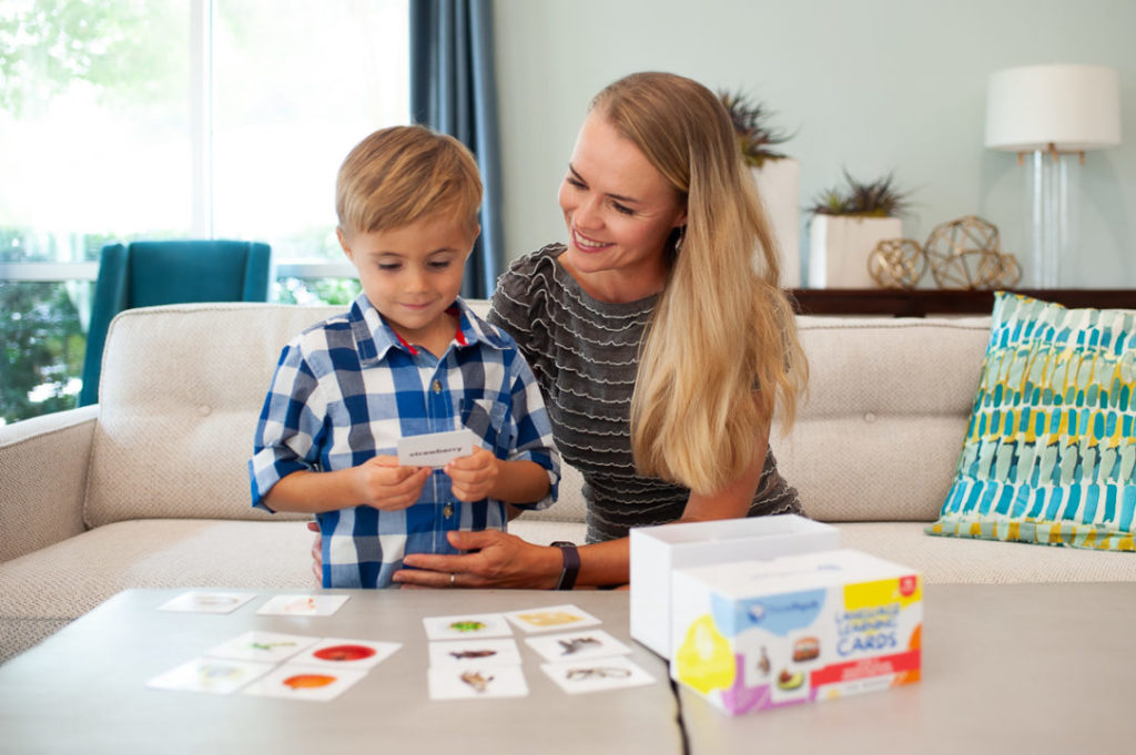 Mother and child using ThinkPsych Flashcards to learn sight words